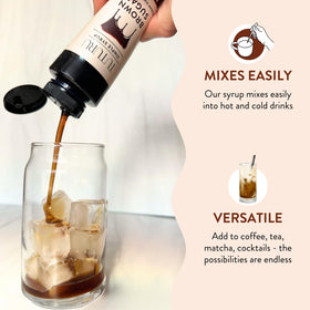 Cocktail glass featuring TUTURU syrup for warm, balanced cocktails.