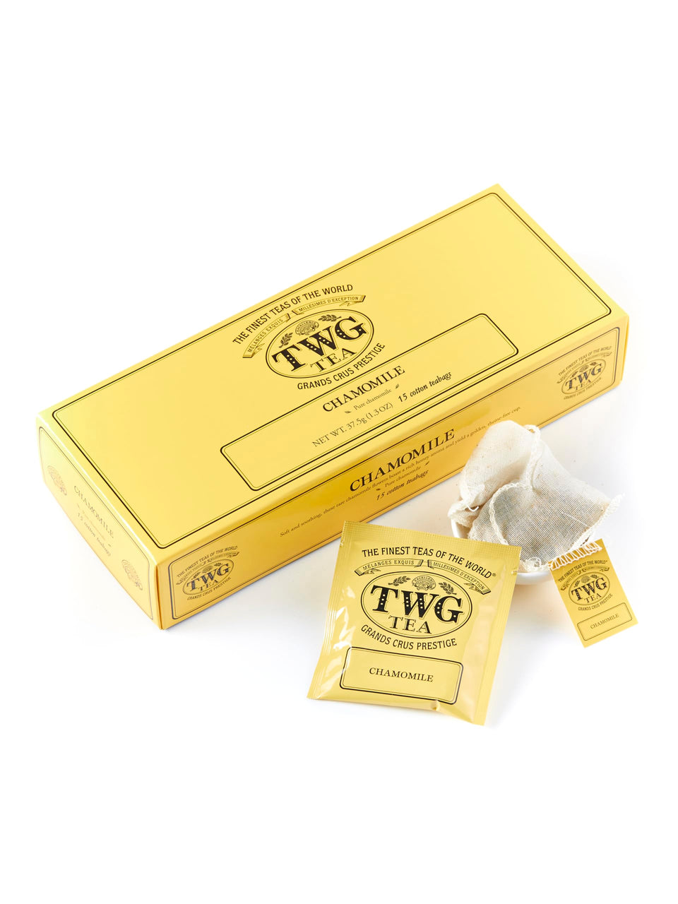 TWG Chamomile tea bag close-up showing gentle aroma and leaves.