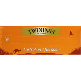 Twinings Australian Afternoon Tea cup with steam, perfect for pairing with biscuits.