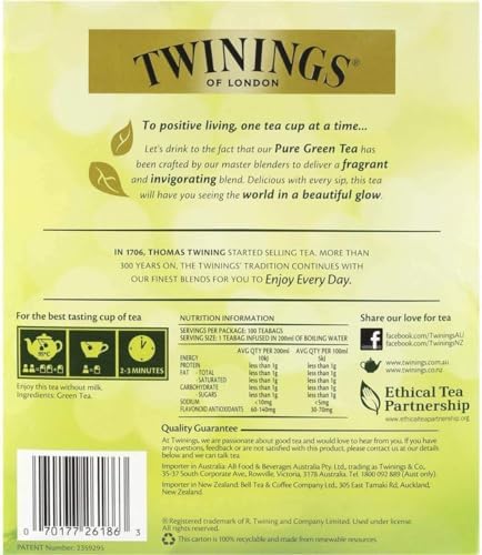 Dry tea leaves beside a Twinings bag highlighting natural flavor