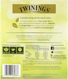 Dry tea leaves beside a Twinings bag highlighting natural flavor
