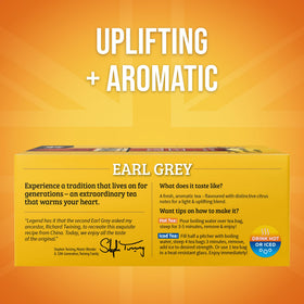 Twinings Earl Grey tea bags beside a hot cup, inviting aroma