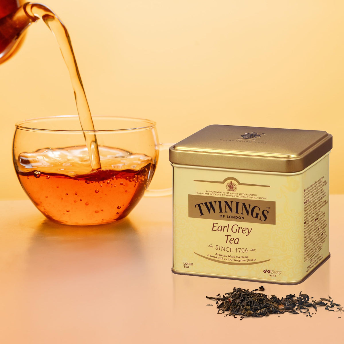 Twinings Earl Grey loose leaves and spoon prepared for steeping