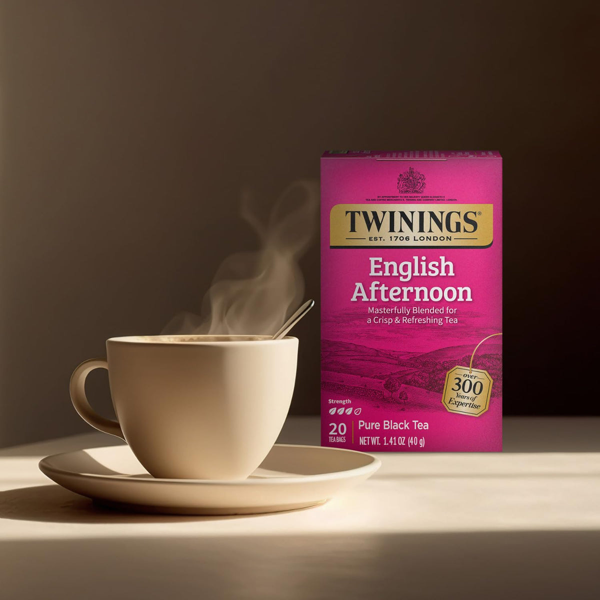 Opening a Twinings tea pack highlighting convenient individually wrapped bags