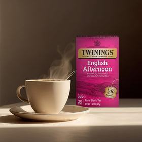 Opening a Twinings tea pack highlighting convenient individually wrapped bags