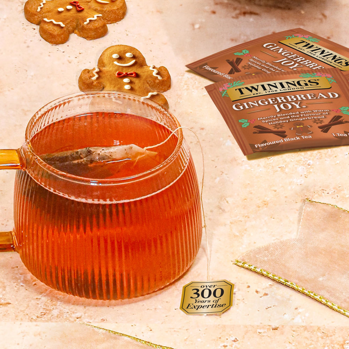 Twinings Gingerbread Joy iced tea poured over ice for a refreshing chill