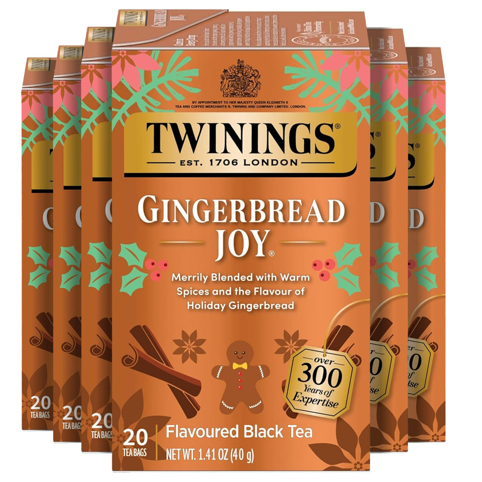 Twinings Gingerbread Joy tea bag steeping to evoke cozy holiday warmth