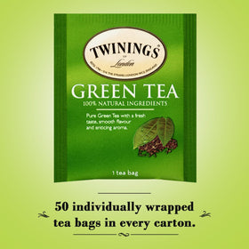 Twinings Green Tea Bags close-up reveals delicate leaves and golden infusion