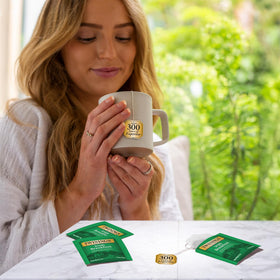 Twinings Irish Breakfast tea bags pack emphasizes convenient, on-the-go freshness.