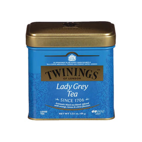 Twinings Lady Grey tea tin with lemon peel closeup, bright citrus aroma for refreshing brews
