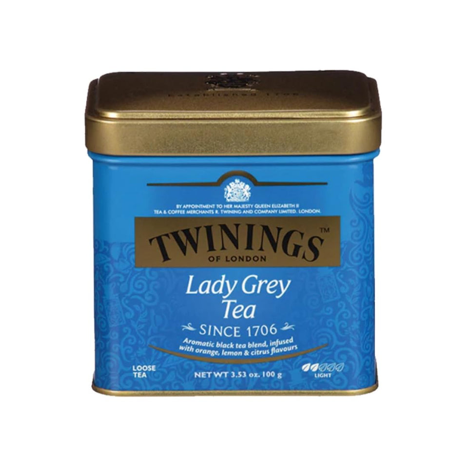 Twinings Lady Grey tea tin with lemon peel closeup, bright citrus aroma for refreshing brews