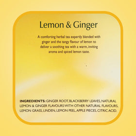 Steam rises from a hot Twinings Lemon & Ginger Tea cup.