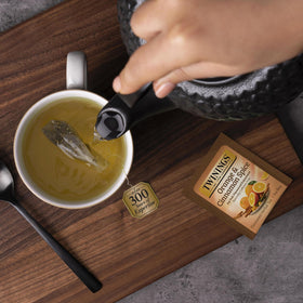 Twinings Orange Cinnamon Spice tea image with zesty citrus notes.