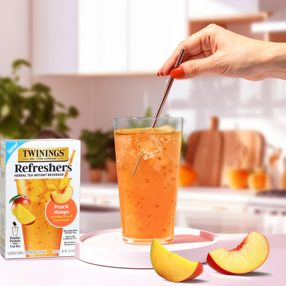 Twinings Peach Mango cafe-style cup ready for a refreshing sip at home