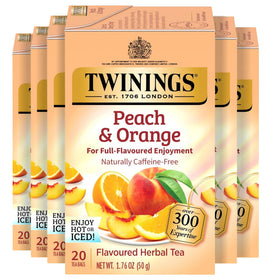 Twinings Peach & Orange Herbal Tea bags from a six-box collection, fruity aroma.