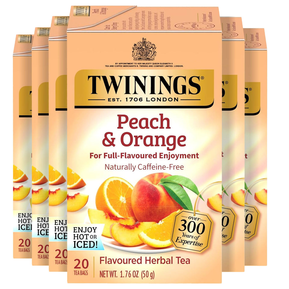 Twinings Peach & Orange Herbal Tea bags from a six-box collection, fruity aroma.