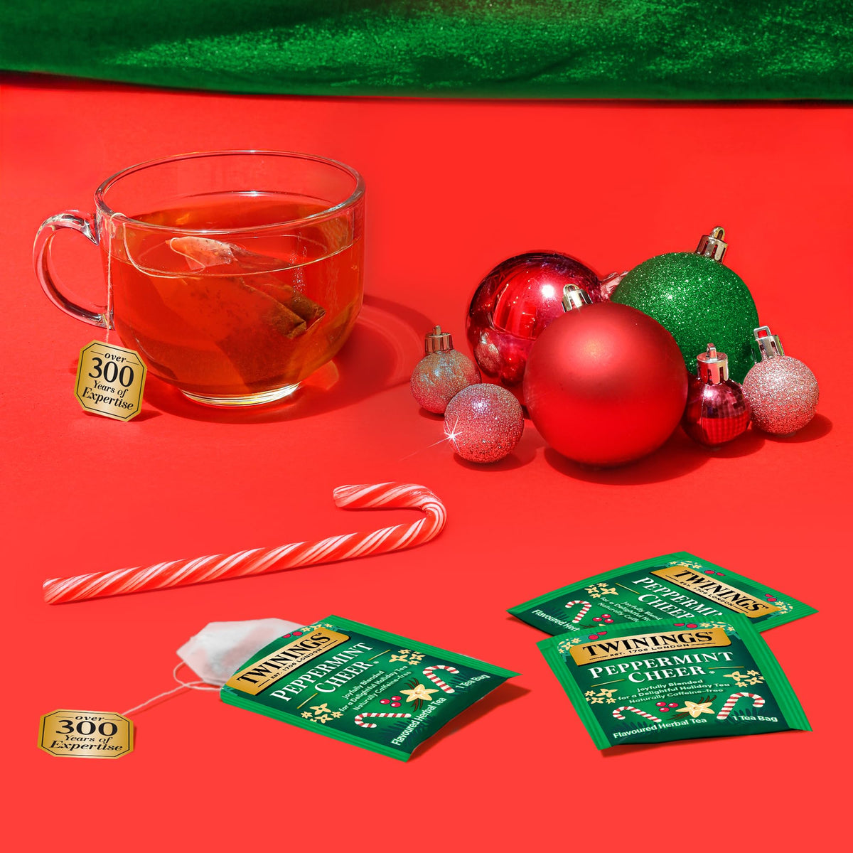 Twinings Peppermint Cheer cup steaming, inviting a refreshing sip.