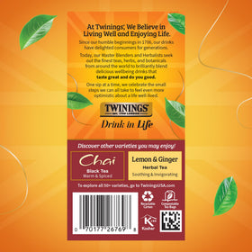 Twinings Pumpkin Spice Chai autumn decor backdrop providing warm mood lighting.