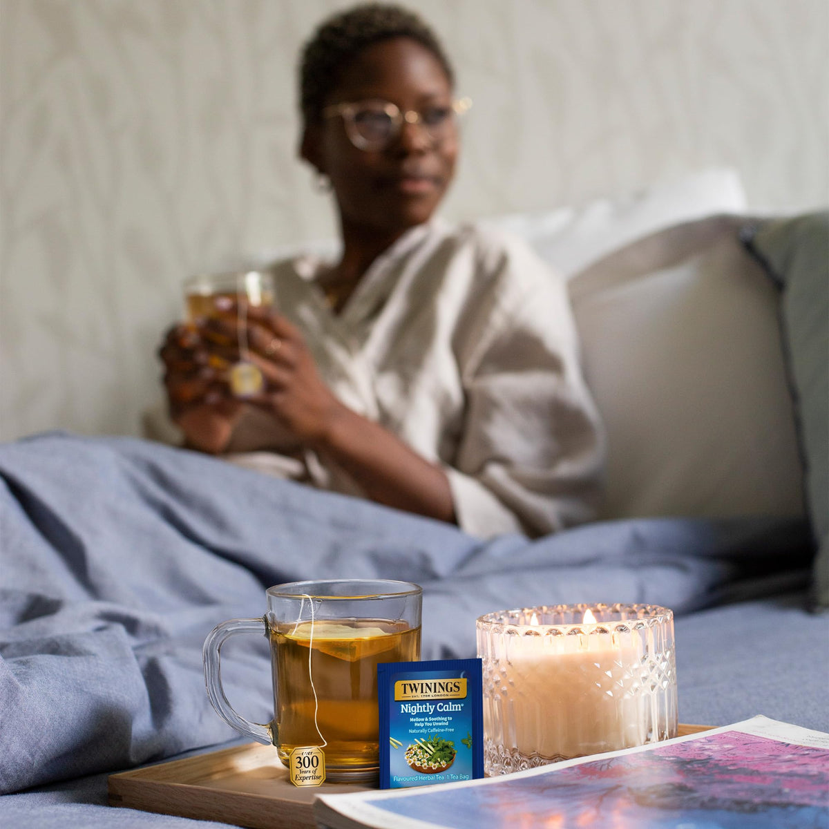Twinings Nightly Calm cup steaming with warm aroma and mellow taste.