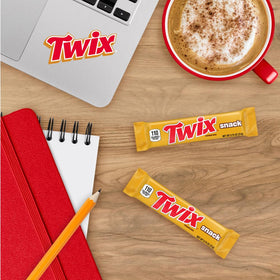 Twix bars with gold wrappers designed for on-the-go consumption.