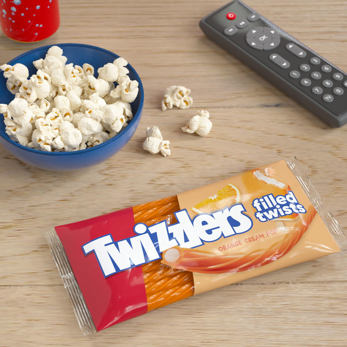 Twizzlers Orange Cream Pop packaging front shows kosher-labeled candy