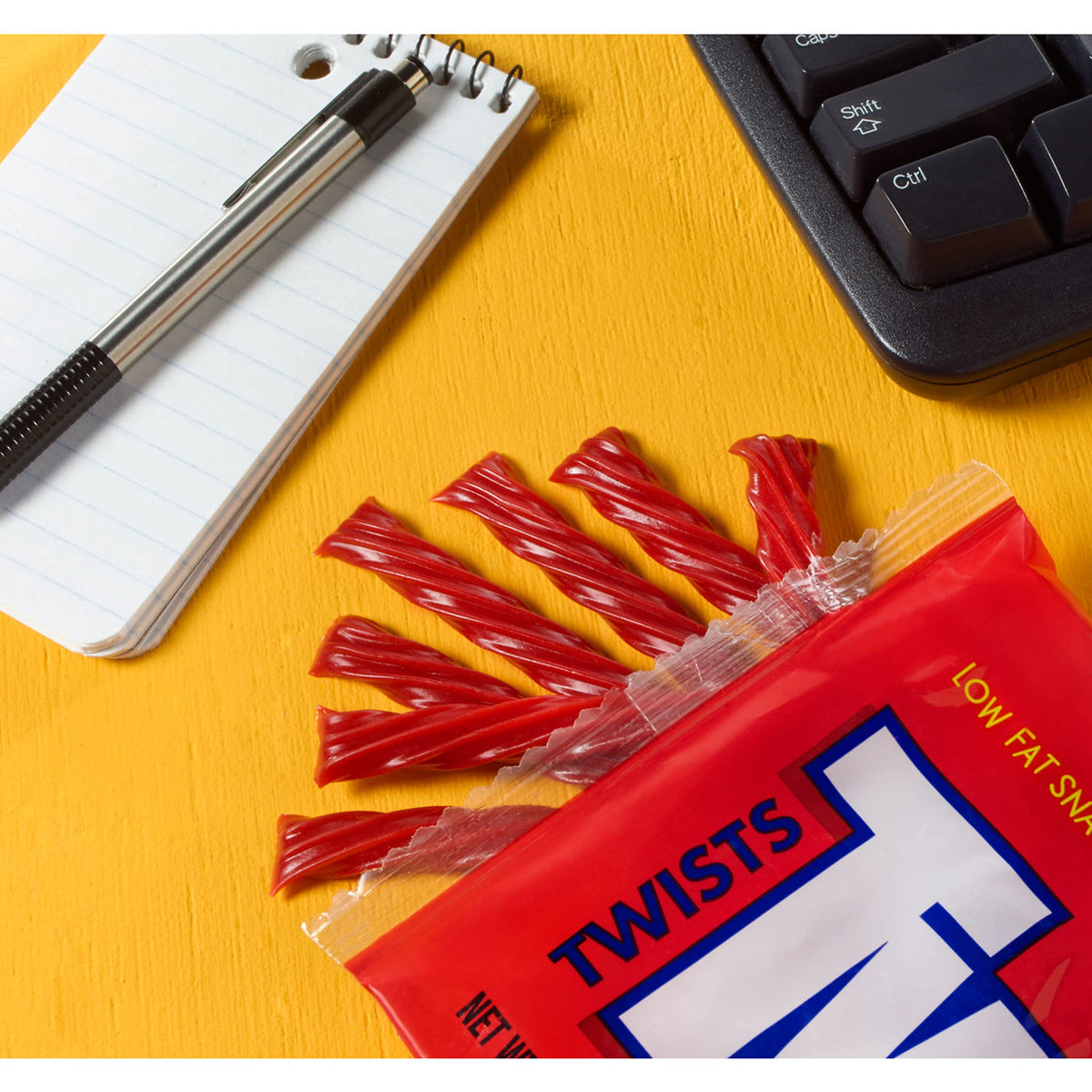 Bulk concession stand display featuring Twizzlers Twists strawberry candy.