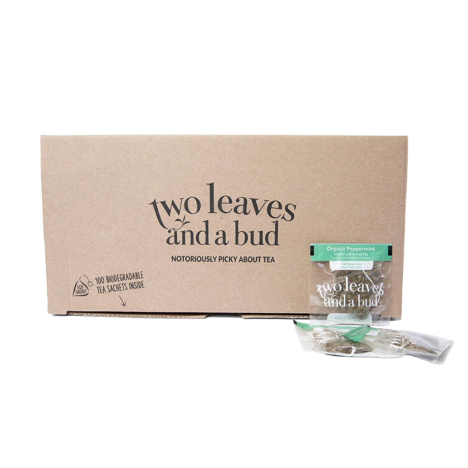 Two Leaves and a Bud organic peppermint tea bags in a cup, highlighting crisp aroma and flavor