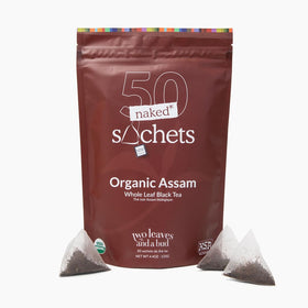 Two Leaves and a Bud Assam sachets in unwrapped packaging for eco-friendly tea.