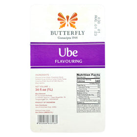 Ube Butterfly flavoring extract bottle pour demonstrates easy seasoning for recipes.