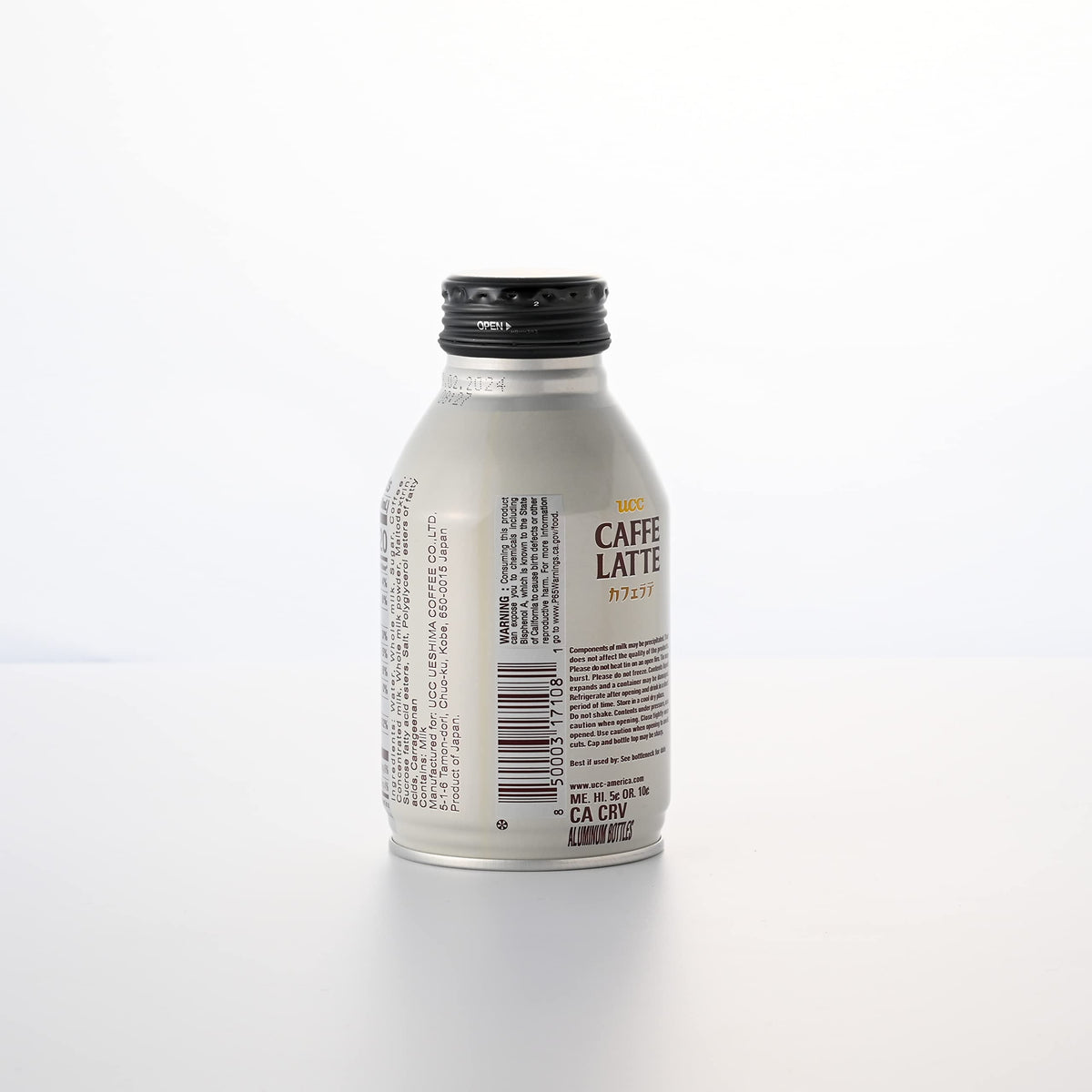Steaming cup of UCC Caffe Latte, inviting aroma and smooth finish.