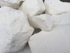 UCLAYS White Mountain edible chalk chunks close-up showing creamy texture for culinary use