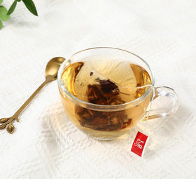 ULTHMOK Essiac dry leaf blend showing natural burdock, sorrel, elm, and rhubarb.