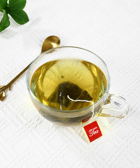Steaming ULTHMOK Moringa Tea cup offers a warm, comforting moment.