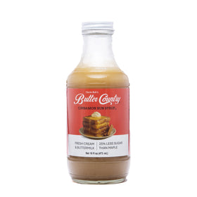 Uncle Bob's Cinnamon Bun Syrup bottle adds rich flavor to pancakes