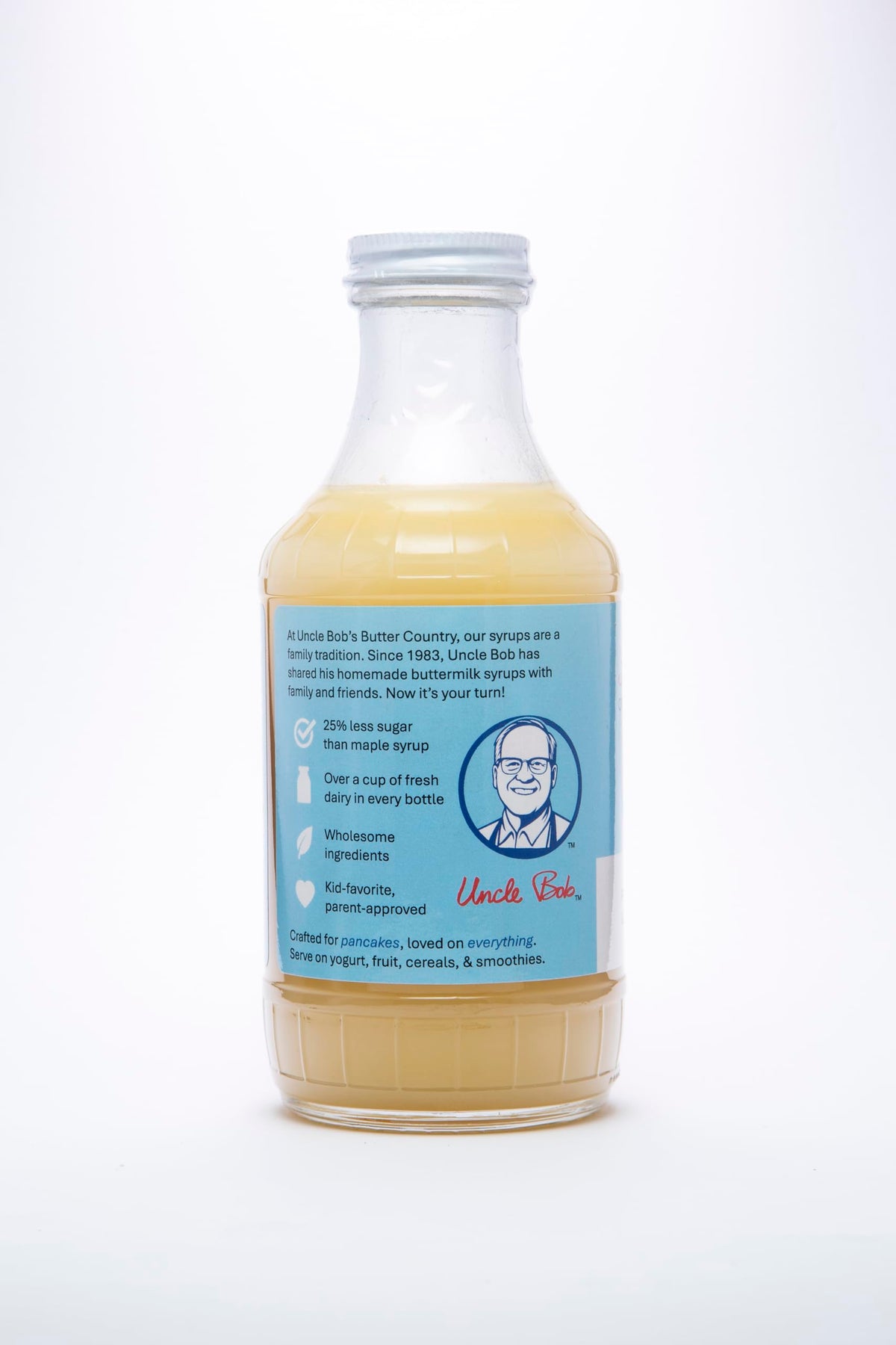 Refrigerated glass bottle of Uncle Bob's Butter Country syrup