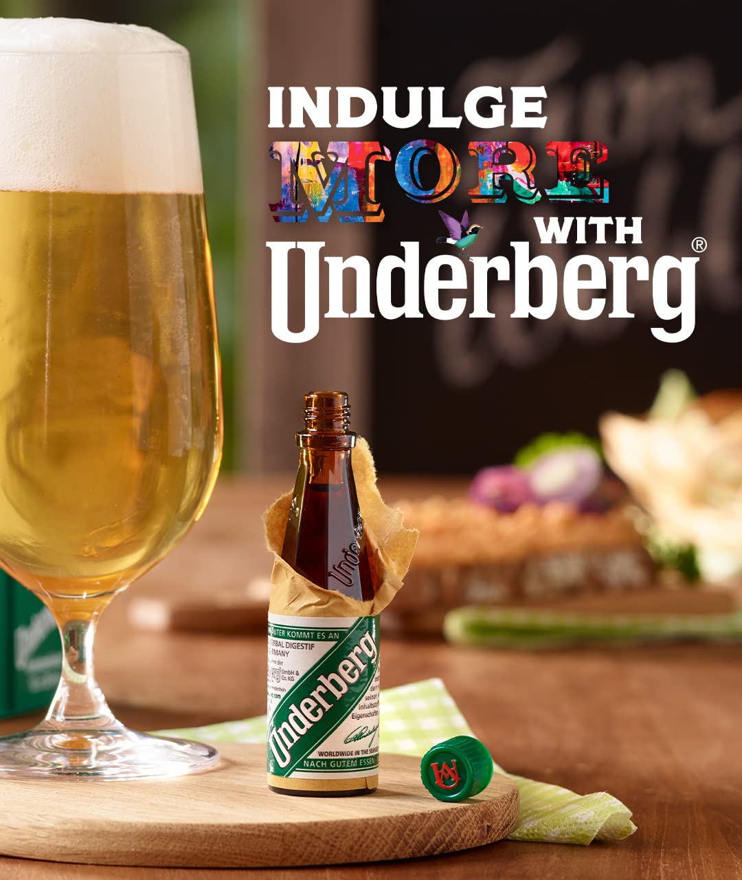 Underberg single-portion bottle with straw-paper wrapper, ideal for travel.