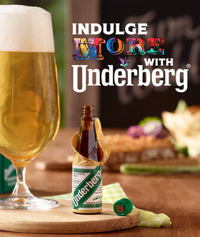 Underberg single-portion bottle with straw-paper wrapper, ideal for travel.