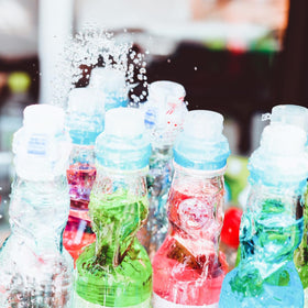 UNHA'S Ramune Orange bottle delivering zesty citrus lift for any moment.