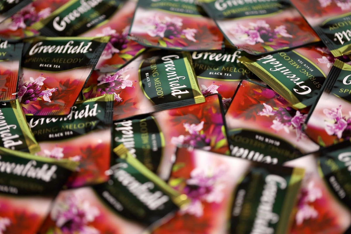 Steeped Spring Melody tea in a cup offers a soothing, aromatic experience
