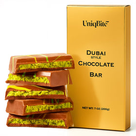 UniqBite Dubai Pistachio Chocolate Bar on plate, premium dessert treat.