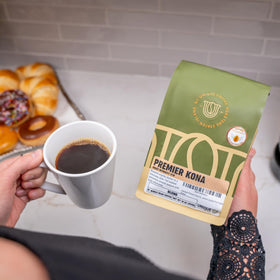 Unique Coffee Roasters Premier Kona family roaster portrait highlights decades of craft