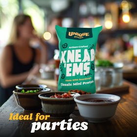 Unique Snacks Knead Ems kitchen scene emphasizes artisan quality and enjoyment