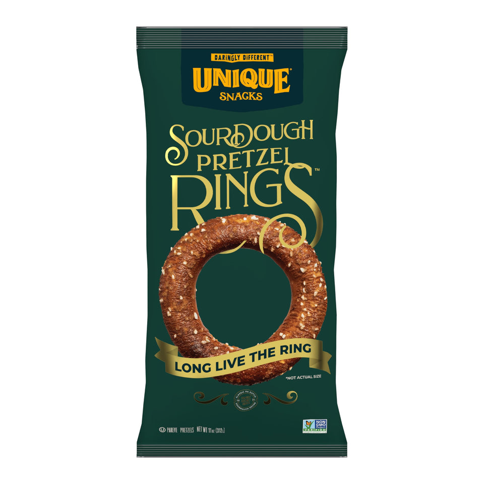 Unique Snacks sourdough craft beer pretzel rings on a board, ideal for beer pairings and sharing.