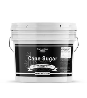 Unpretentious cane sugar bucket close-up highlighting bulk storage for baking.