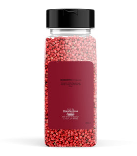 Unpretentious Pink Peppercorns closeup highlights bright berries and fresh fruity scent for seasoning