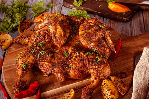 Unpretentious Trinidad Scorpion Pepper Powder pour shows dramatic spice addition to dishes