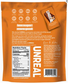 Closeup of UNREAL bars showing chewy nougat and roasted peanuts texture for flavor depth.
