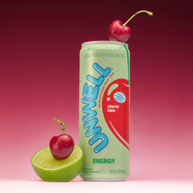 Unwell Energy Cherry Lime pour into glass showing fizz and refreshing taste