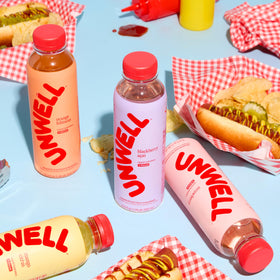 Unwell Hydration 12-pack packaging ready for fridge or gym bag.