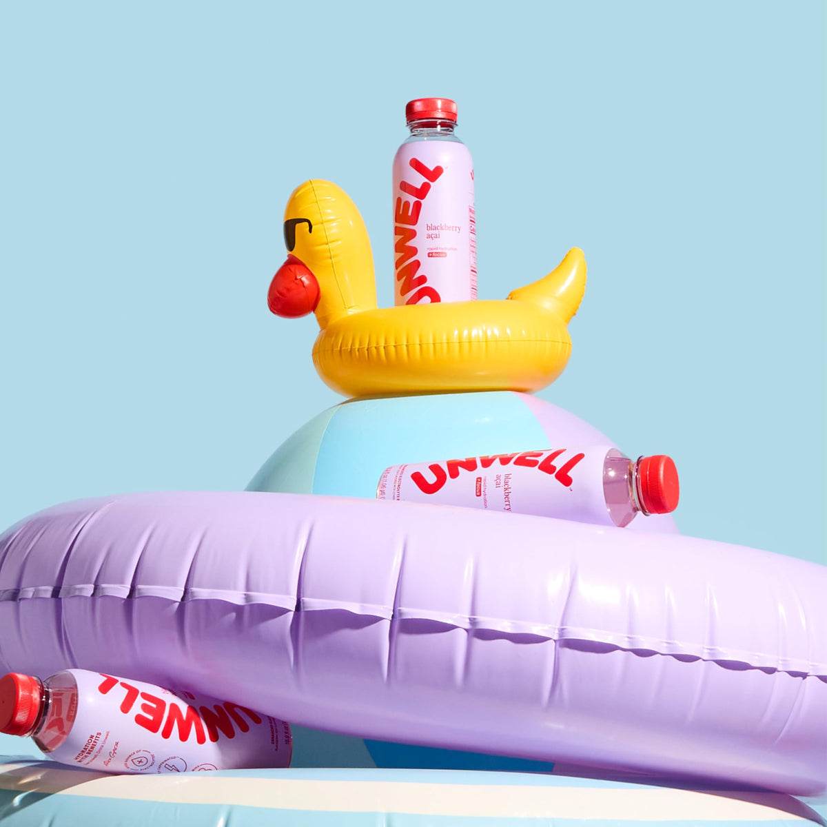 Unwell Hydration closeup of ingredients highlights natural blackberry and acai flavors.